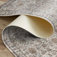 Load image into Gallery viewer, Patterned rug on a wooden floor