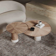 Load image into Gallery viewer, Wooden coffee table with a smaller side table in a living room setting placed on a round cozy floor mat.