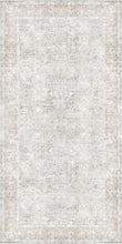 Load image into Gallery viewer, Rectangular area vinyl rug with a subtle pattern on a light background