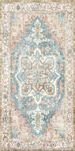 Load image into Gallery viewer, Decorative rug with intricate pattern in blue, beige, and brown on a beige background