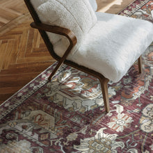 Load image into Gallery viewer, White cushioned chair on a patterned farmhouse rug with wooden floor