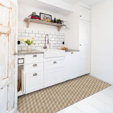 Load image into Gallery viewer, Modern kitchen with white cabinets, tiled backsplash, and a patterned rug on the floor.
