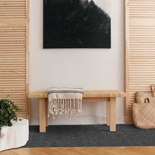 Load image into Gallery viewer, easy to clean non washable vinyl mat with black fabric texture under a wooden bench