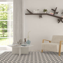 Load image into Gallery viewer, Grey vinyl mat inspired by Spanish floor tiles in a modern living room