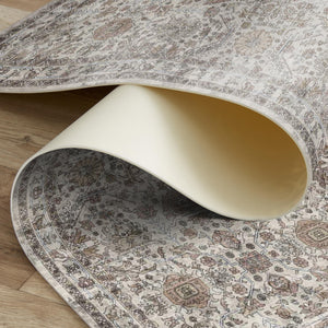 Patterned rug on a wooden floor