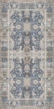 Load image into Gallery viewer, Patterned rug with blue and beige colors on a white background
