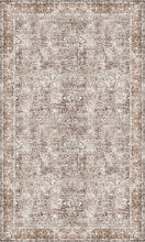 Load image into Gallery viewer, A rectangular area rug with an intricate traditional floral pattern in muted beige, brown, and off-white tones.
