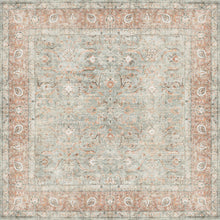 Load image into Gallery viewer, A square chair mat with a distressed traditional pattern in muted tones of dusty blue-gray, terracotta, beige, and off-white.
