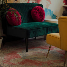 Load image into Gallery viewer, Green velvet bench with pink cushions in a room with a yellow chair and colorful boho rug.
