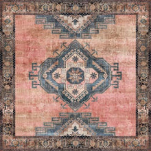 Load image into Gallery viewer, Decorative rug with geometric boho pattern on a pink background
