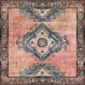 Decorative rug with geometric boho pattern on a pink background