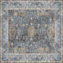 Load image into Gallery viewer, Decorative rug with intricate patterns in blue and beige tones
