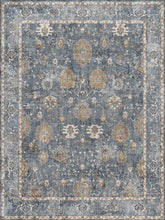 Load image into Gallery viewer, Decorative rug with intricate patterns on a blue background
