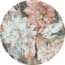 Load image into Gallery viewer, Round rug with floral pattern on a white background
