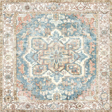 Load image into Gallery viewer, Decorative rug with intricate pattern in blue, pink, and beige on a white background
