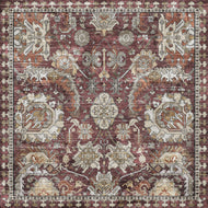Patterned rug with geometric design in red, beige, and brown colors.
