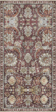 Load image into Gallery viewer, Decorative vinyl rug with intricate patterns on a brown background
