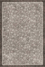 Load image into Gallery viewer, A square area rug with an intricate, distressed floral and vine pattern in shades of taupe, beige, and brown, framed by a textured dark brown border.
