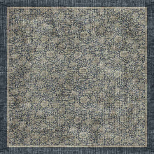 Load image into Gallery viewer, A square area rug with a distressed, vintage-style floral pattern in muted beige, gray, and navy blue tones, featuring a solid dark border.
