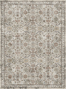 Patterned rug with intricate design on a neutral background