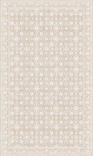 Load image into Gallery viewer, Patterned desk mat with small floral design on a beige background
