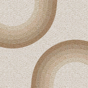 Close-up of a textured beige and brown circular pattern