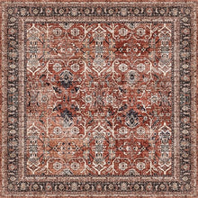 Load image into Gallery viewer, Decorative rug with intricate pattern in red, black, and beige on a dark background

