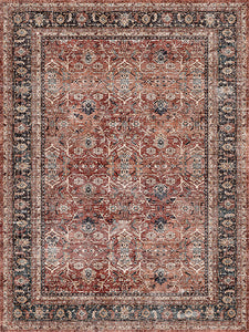 Decorative rug with intricate pattern in red, beige, and black on a matching background