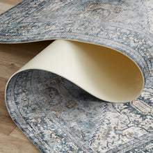 Load image into Gallery viewer, Decorative rug with intricate patterns on a wooden floor
