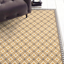 Load image into Gallery viewer, Golden color vinyl mat design inspired by Spanish floor tiles - located in a living room
