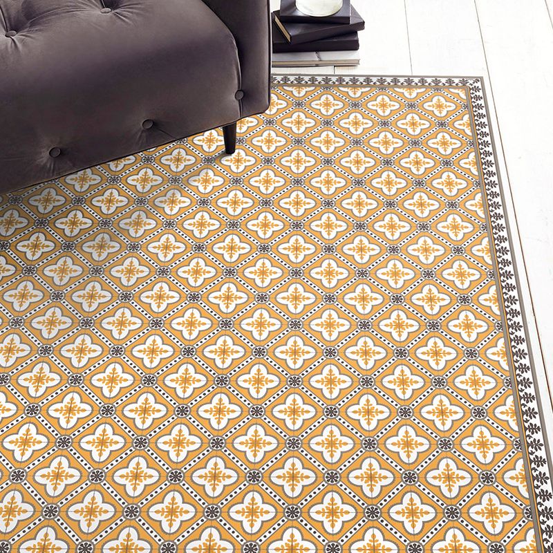 Golden color vinyl mat design inspired by Spanish floor tiles - located in a living room