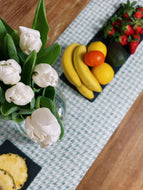 Fruit plate placed on a long stain resistant table runner